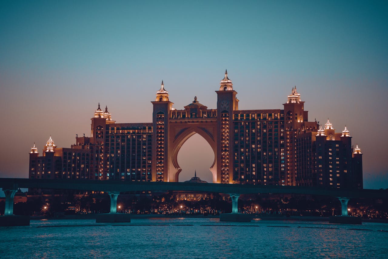 Stunning view of Atlantis The Palm hotel illuminated against the Dubai night sky.